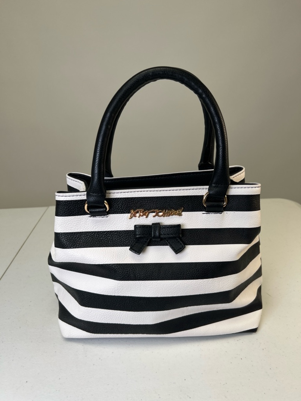 Betsey Johnson Black & White Striped Satchel with Bow-Accent and Gold Logo